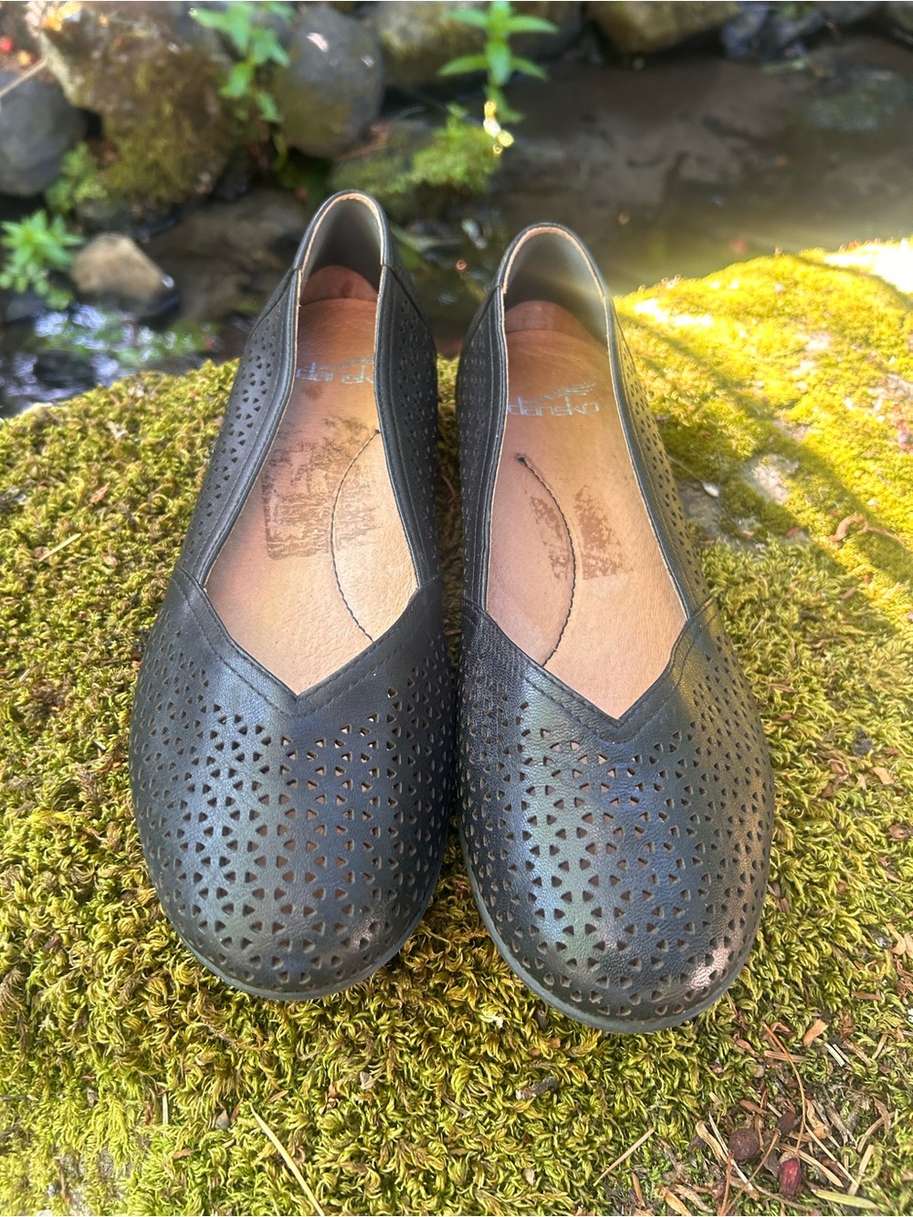 Dansko Black Perforated Leather Slip-Ons